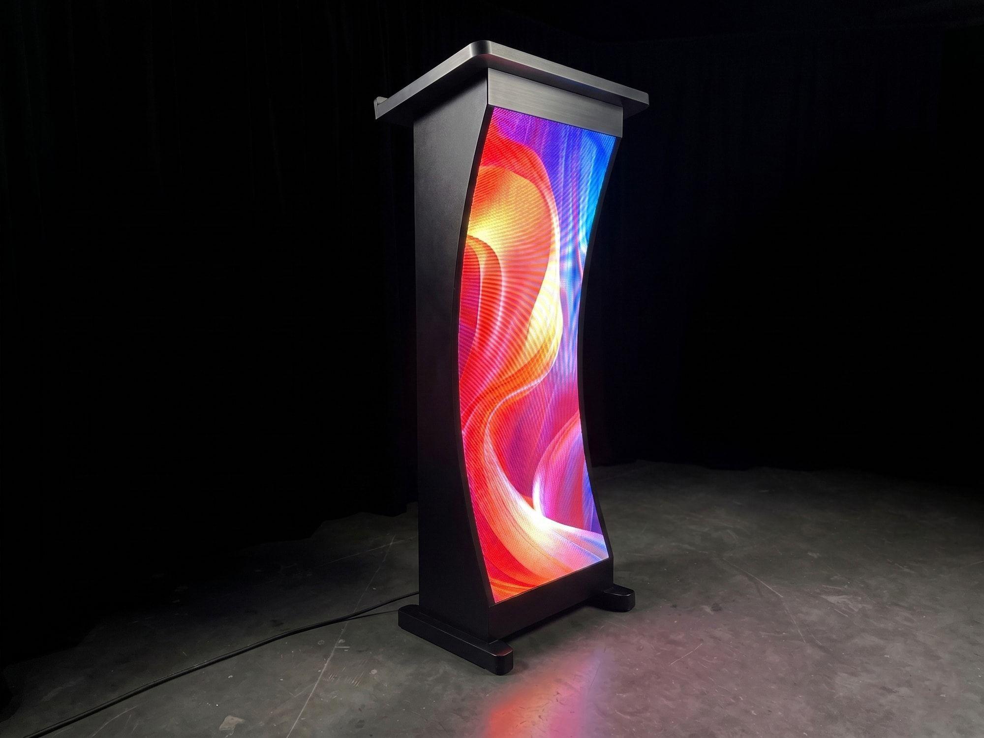 Curved LED podium with a flowing graphic on its front face